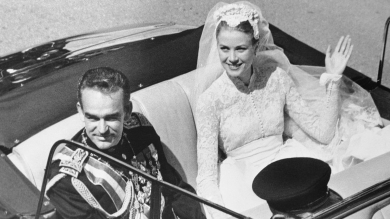 Grace Kelly and Prince Rainier on the way to the palace in 1956
