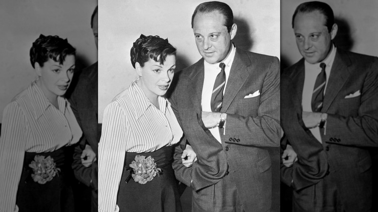 Judy Garland standing next to Sid Luft
