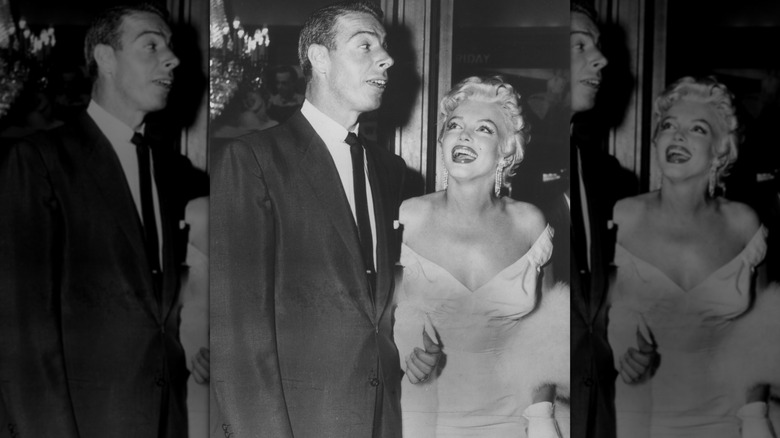 Marilyn Monroe smiling up at Joe DiMaggio