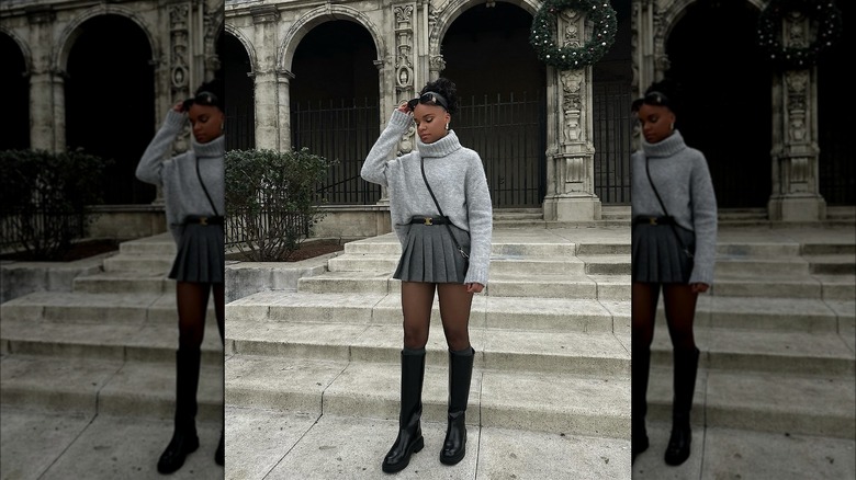 Woman wearing black boots