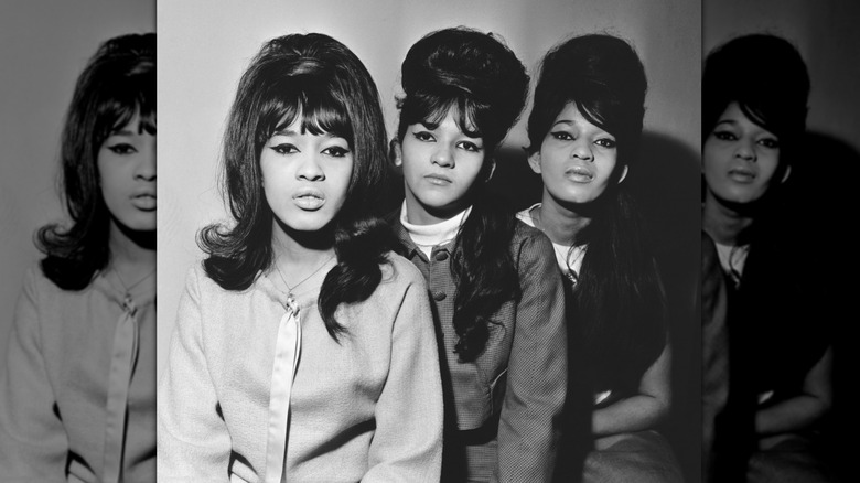 Black-and-white photo of The Ronettes with their hair styled into various iterations of beehives
