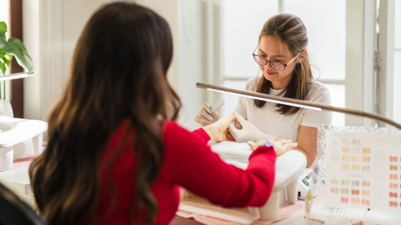 Woman getting a manicure