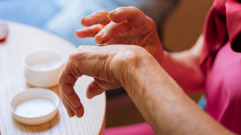 Person applying hand cream