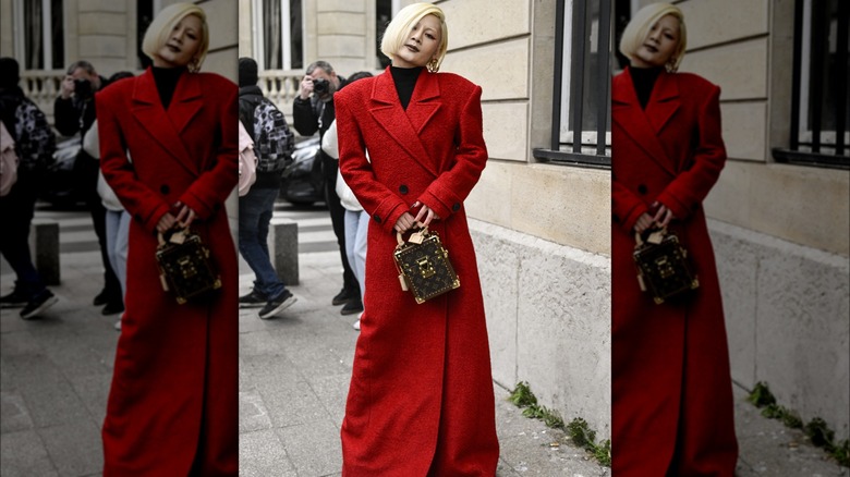 A woman in a red jacket 