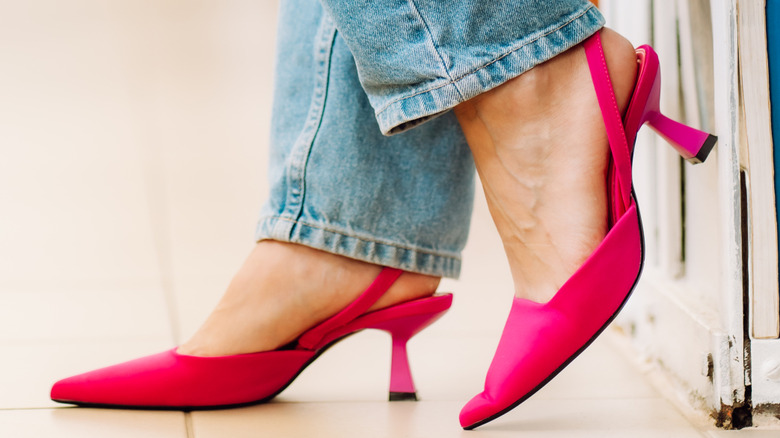 Woman wearing pink shoes
