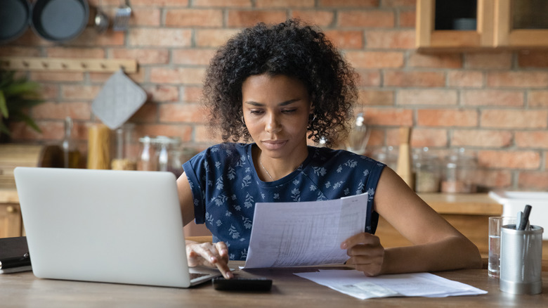 Woman making a budget 