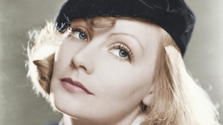 Greta Garbo photographed in a hat with a head tilt