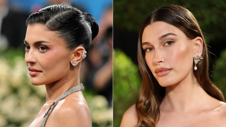 Kylie Jenner and Hailey Bieber wearing statement earrings