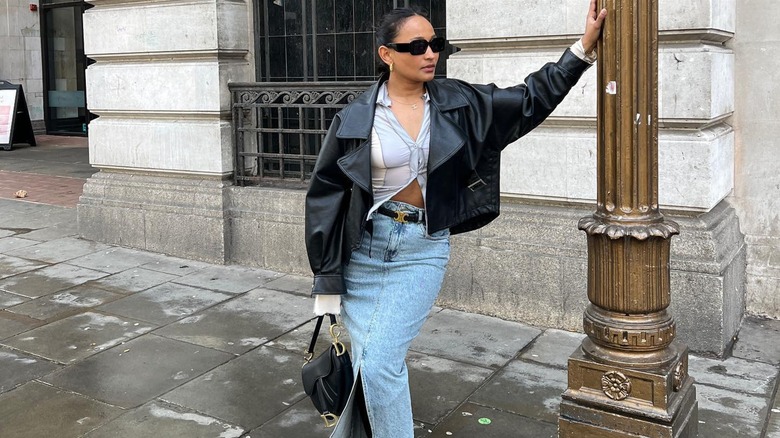 A woman in a denim maxi skirt