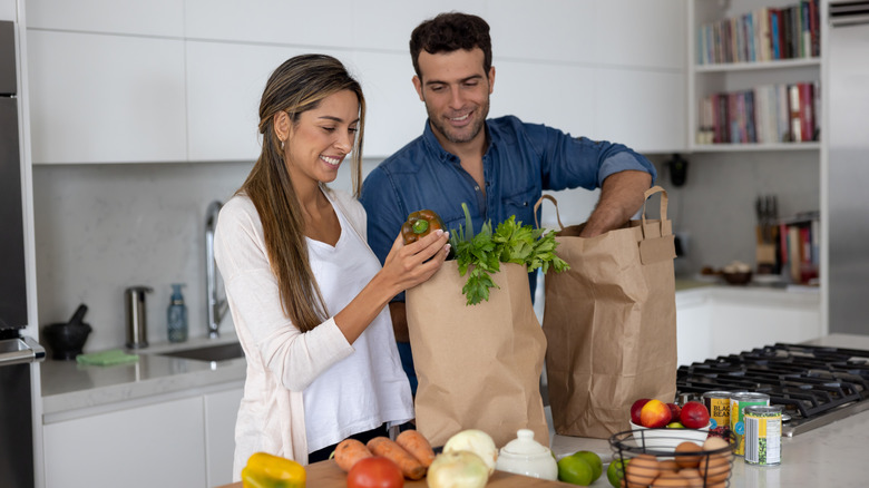 A happy couple in the kitchen