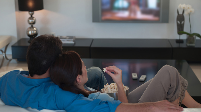 A couple watching TV