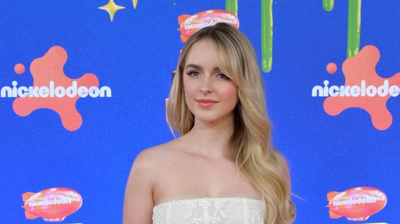 Mckenna Grace wearing a white dress