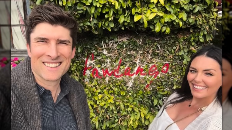 Taylor Cole smiling with Cameron Larson