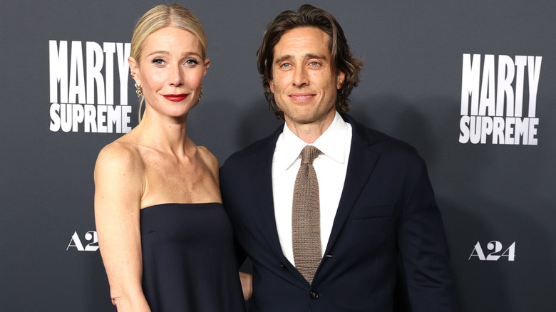 Gwyneth Paltrow and Brad Falchuk attend the Los Angeles premiere of A24's "Marty Supreme" at Samuel Goldwyn Theater on December 08, 2025 in Beverly Hills