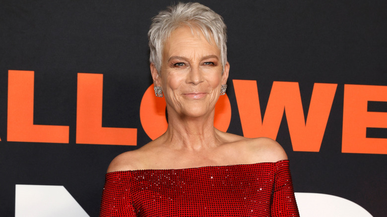 Jamie Lee Curtis wearing a red dress