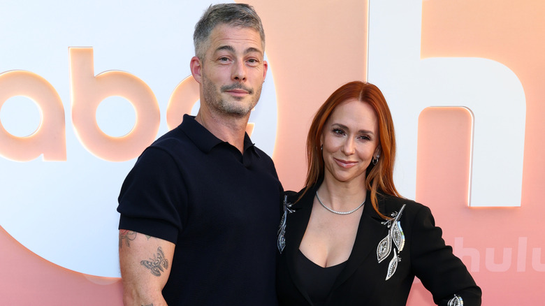 Brian Hallisay and Jennifer Love Hewitt smiling