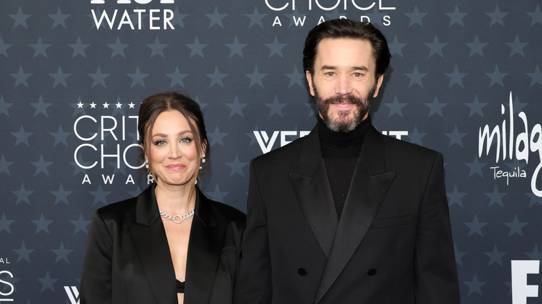 Kaley Cuoco and Tom Pelphrey on the red carpet wearing all black