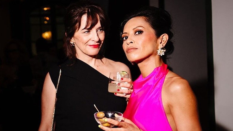 Amielynn Abellera and Anastasia Coon holding drinks