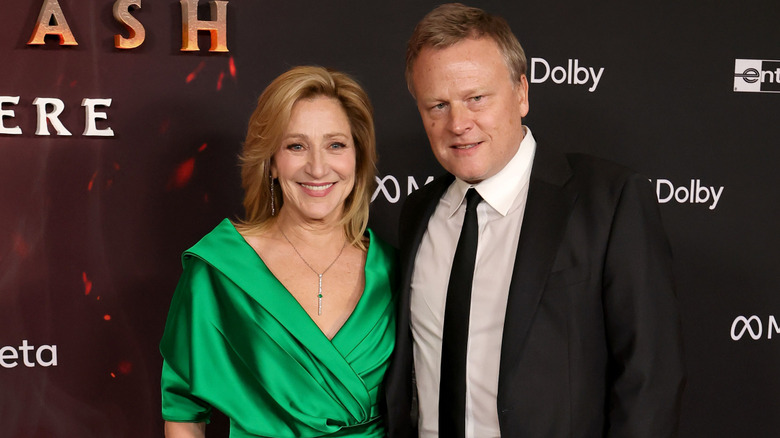 Edie Falco and Keith Cotton attend the Global Premiere of 20th Century Studios' "Avatar: Fire and Ash" at Dolby Theatre on December 01, 2025 in Hollywood