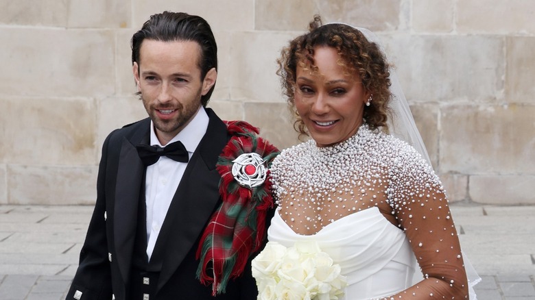 Rory McPhee and Mel B depart St Paul's Cathedral after their wedding on July 05, 2025 in London