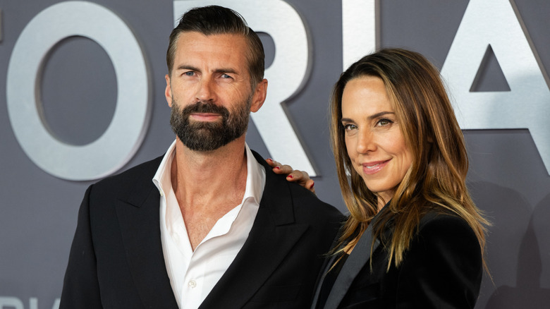 Chris Dingwall and Melanie Chisholm attend the "Victoria Beckham" World Premiere at the Curzon Mayfair in October 2025