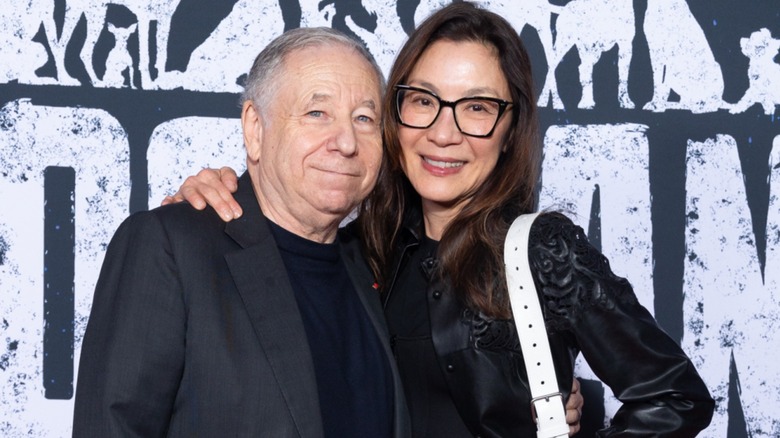 Michelle Yeoh and Jean Todt posing on the red carpet