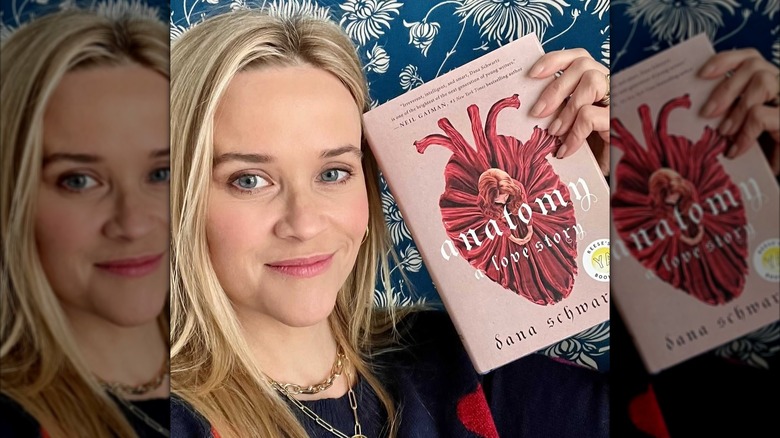 Reese Witherspoon holding a copy of Anatomy