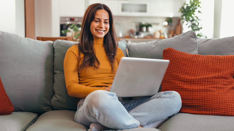 Woman on the couch with her computer