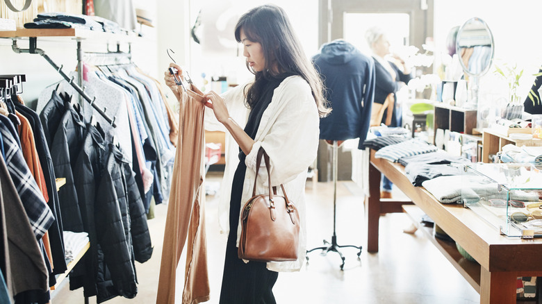 Woman shopping for pants