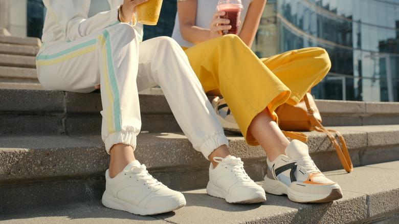 Women wearing chunky sneakers
