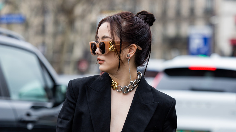 Woman wearing dual metals