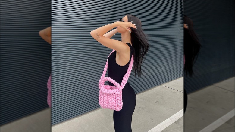Woman with a knitted bag