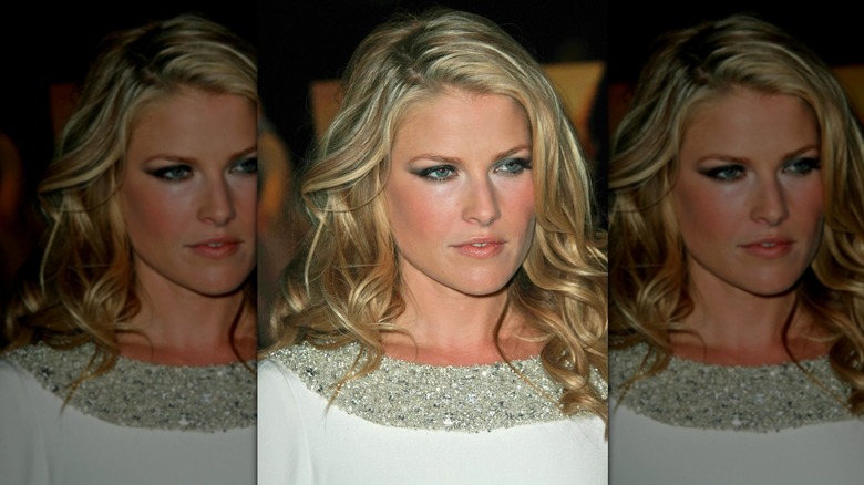 Ali Larter with curly blow out and a sequined collared white dress