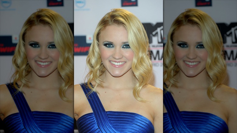 Emily Osment with a blond lob in a side part