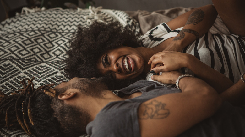 Happy couple in bed