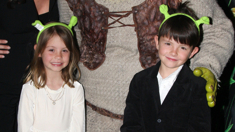 Carys Zeta Douglas and Dylan Michael Douglas pose backstage at "Shrek: The Musical" on Broadway at the Broadway Theatre on March 21, 2009 in New York City