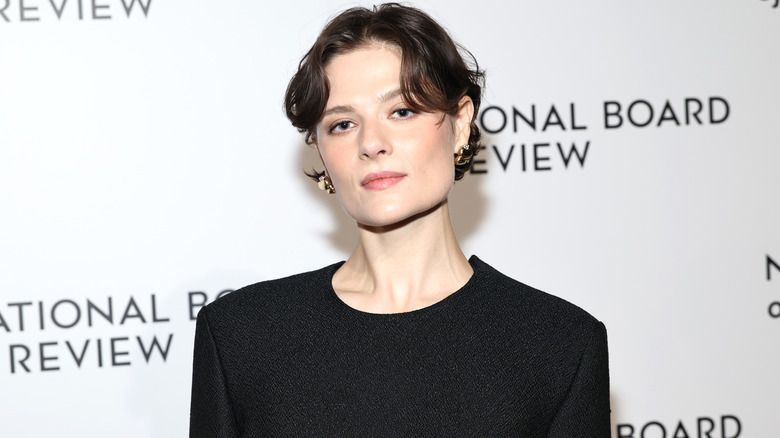 Louisa Jacobson wearing a black, long-sleeved piece with a short hairstyle at the National Board of Review Annual Awards Gala in 2026