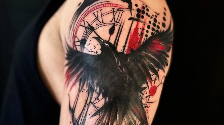 Trash polka arm tattoo