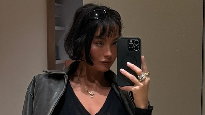 A woman with a French bob