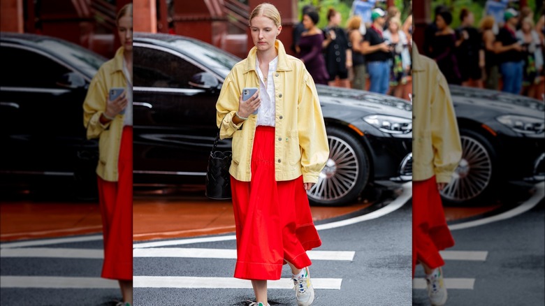 A woman in red and yellow 