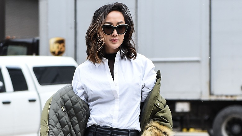 woman in white button down