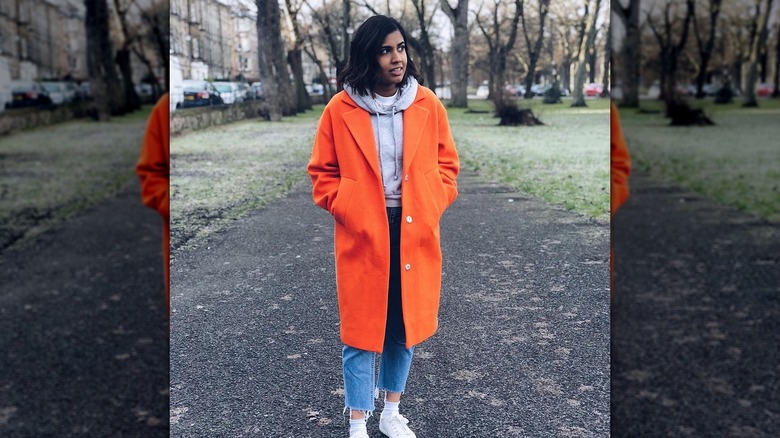 Wearing orange coat