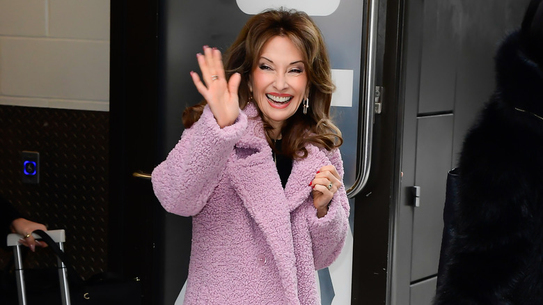 Susan Lucci smiles and waves outside in New York City