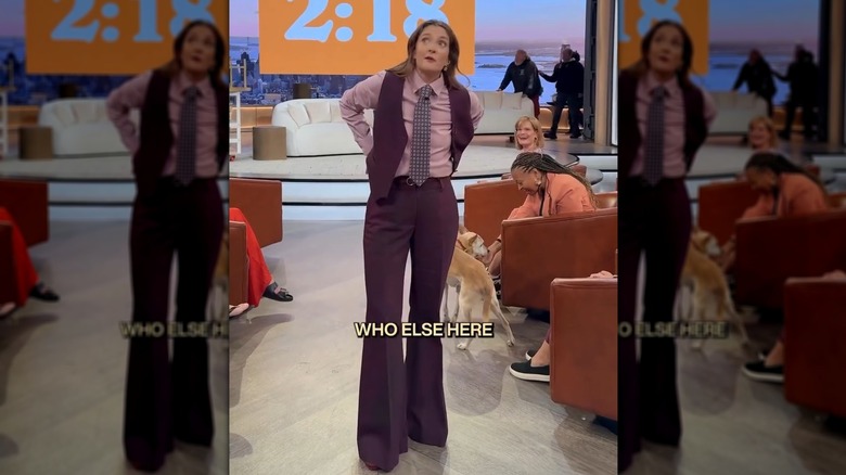 Still of Drew Barrymore on her daytime talk show wearing a menswear-inspired look