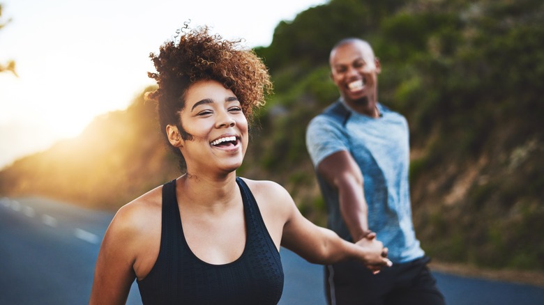 Happy Black couple on a run 