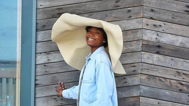 Woman in an oversized sun hat