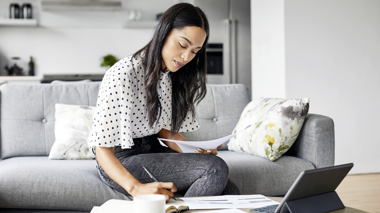 Woman analyzing finances
