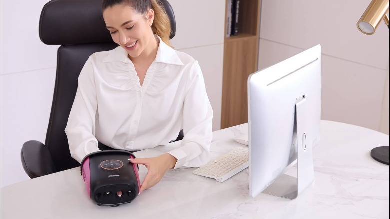 woman uses CINCOM at her desk