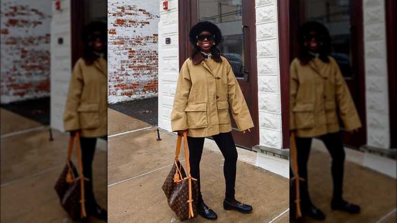 A woman on Instagram in leggings and loafers with a barnyard jacket