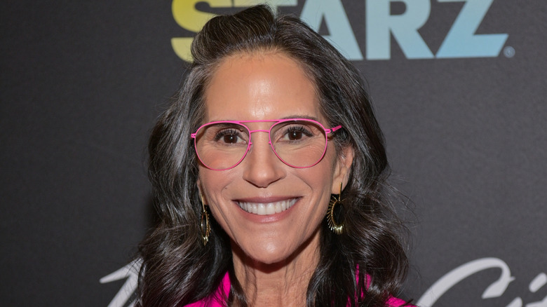 Jami Gertz smiles on the red carpet in 2025